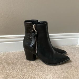 Black pointed toe booties